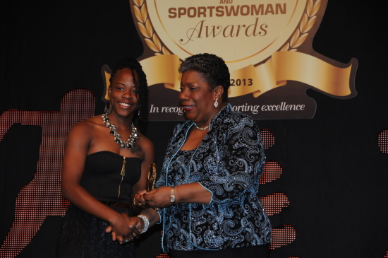 Trudy-Ann Knight being presented the 2012 RJR National Sportswoman of the Year Award for Hockey by Director General in the Ministry of Tourism, Carole Guntley in Jan 2013